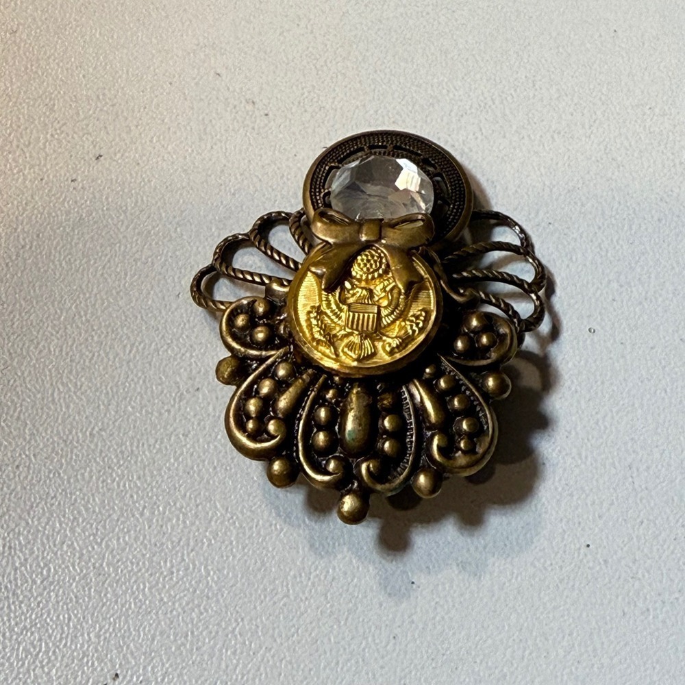 Vintage Gold Tone Brooch with Rhinestone Center & US Seal Button